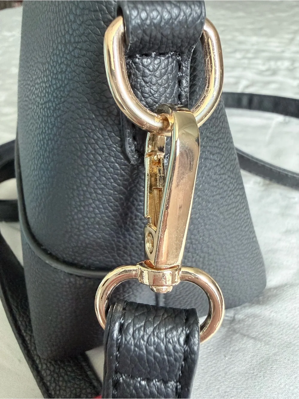 London Fog Black and Gold Pebble-Textured Dome Black Crossbody